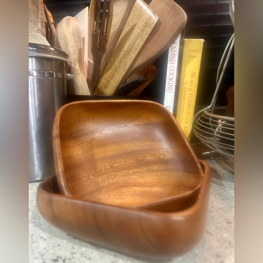 Two monkey pod wood bowls